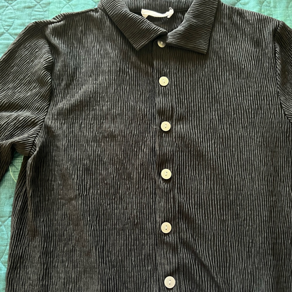 Never wore it,took the tags off